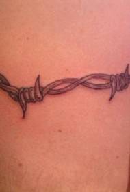 black barbed wire tattoo pattern on the arm