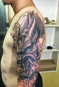 Charming blooms arm handsome evil dragon tattoo picture