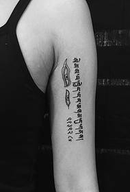 good-looking Sanskrit tattoo tattoo on the outside of the arm