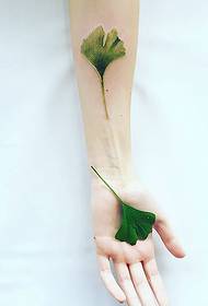 the same arm 3d a green leaf tattoo tattoo