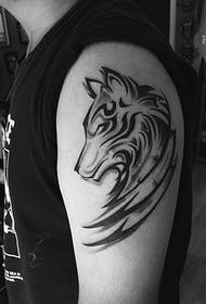 Arm a black and white animal avatar tattoo pattern