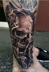 Skull tattoo on the calf