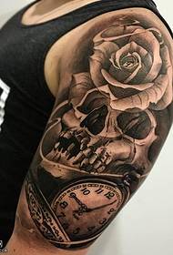 Shoulder realistic skull table tattoo pattern
