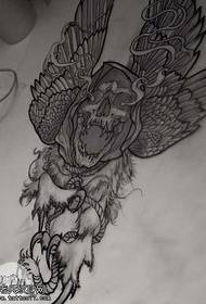 Manuscript skull wings tattoo pattern