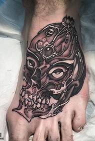 Skull tattoo on the foot
