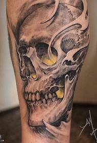 Classic skull tattoo pattern on calf