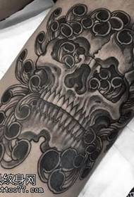 Calf chrysanthemum skull tattoo pattern