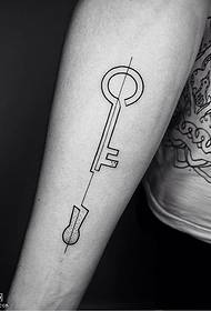 Arm tattooed key tattoo pattern