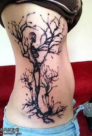 Waist skull and tree tattoo pattern