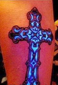 Beautiful cross fluorescent tattoo