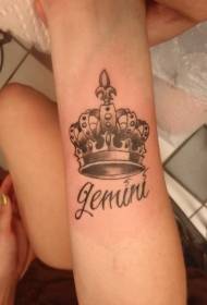 Arm beautiful crown and letter tattoo pattern