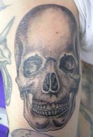 Arm black gray realistic human skull tattoo pattern