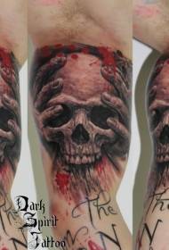 Arm colored man's hand with bloody skull tattoo pattern