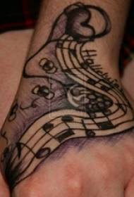 A lány kezét a fekete szürke vázlatpont hátoldalán tüske készségek kreatív jegyzetek irodalmi tetoválás képek
