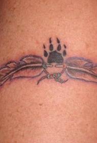 Black paw print and feather tattoo pattern on the legs