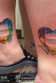 Colorful diamond tattoo pattern on ankle