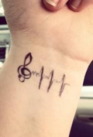 Female wrist on black sketch creative art musical note tattoo picture