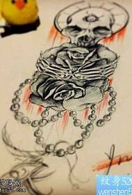 Iphethini ye-Taro rose tattoo