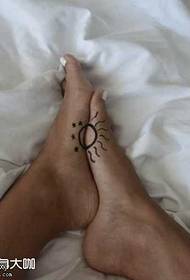 ຮູບແບບ tattoo ແດດແດດ totem