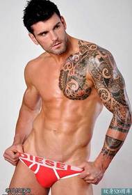 Half-american European and American male model totem tattoo