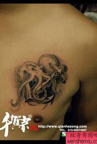 A black and white octopus anchor tattoo pattern popular in the chest