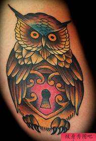 An American and American owl tattoo