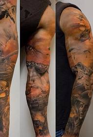 Black tank tattoo pattern on thigh