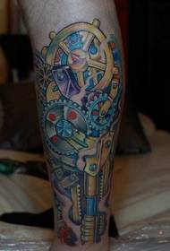 Stylish robotic arm tattoo on the legs