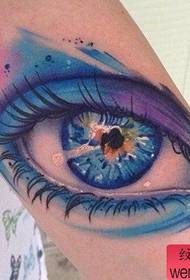 Girl's arm vakkert og vakkert farget øye tatoveringsmønster