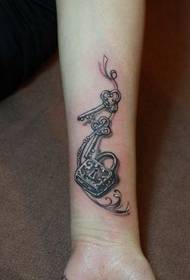 Girl arm lock key tattoo pattern