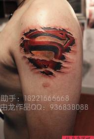 Наоружајте узорак тетоваже логоа популарног поп супермена