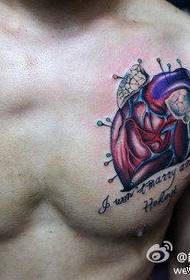 a classic heart tattoo pattern on the male chest
