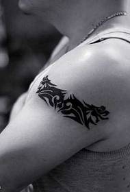 arm black and white dragon totem tattoo pattern