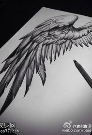 manuscript wings tattoo pattern
