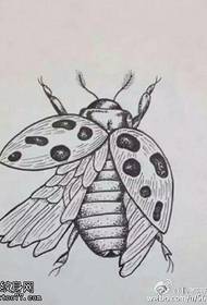 manuscript beetle tattoo pattern