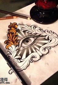 manuscript floral triangle eye tattoo pattern