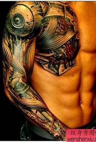 La imagen del espectáculo de tatuajes recomienda un patrón de tatuaje mecánico de medio cuerpo