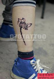 an ink on the ankle Lotus tattoo pattern