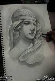 ຮູບແຕ້ມ tattoo Virgin Mary ທີ່ເຮັດດ້ວຍມືດ້ວຍມື
