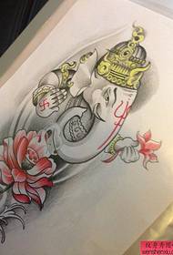 tattoo show Recommend a picture of a lotus-like tattoo manuscript