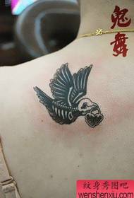 girl's shoulder small and classic skeleton bird tattoo pattern