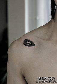 popular black gray lip print tattoo pattern on the shoulder of the boy