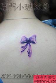 girl back colored bow tattoo pattern