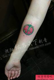 girl arm small and stylish anti-war symbol tattoo pattern