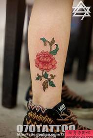 a fresh flower tattoo picture on the calf