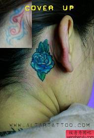 girls ear small and beautiful colored rose tattoo pattern