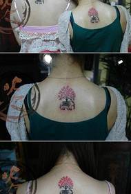 girl's back small elephant and small tree tattoo pattern