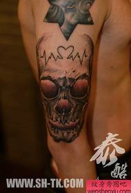 The arm is very popular black and white skull tattoo pattern