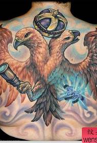 a full back color eagle tattoo works