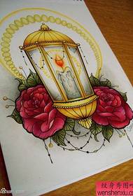 a popular and beautiful candle light rose tattoo pattern